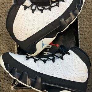 Jordan 9 Retro University Blue Sneakers in White and Black with Blue Jumpman